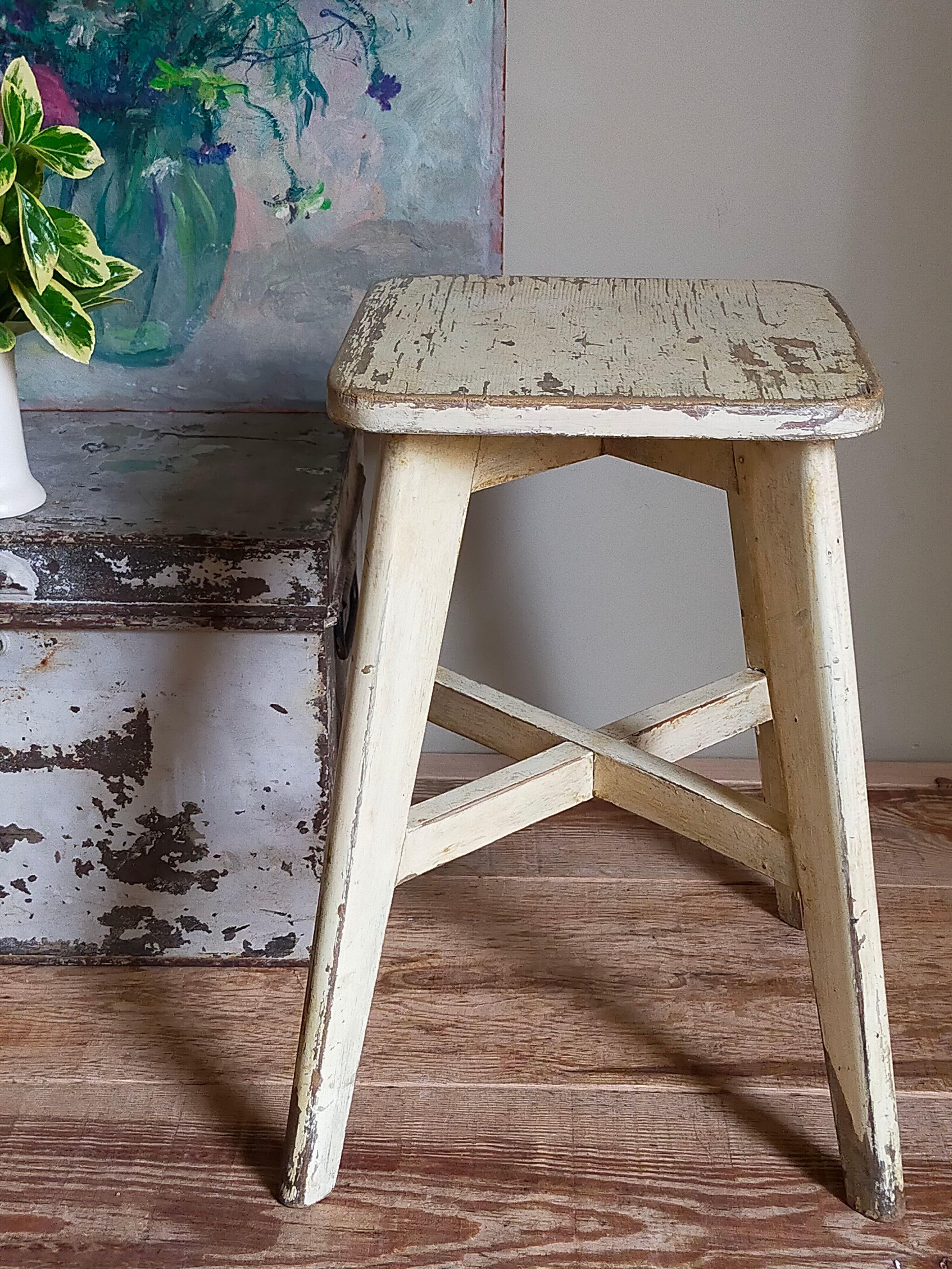 Old workshop stool in patinated solid wood