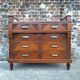 Art Deco commode with marble top, vintage antique furniture.