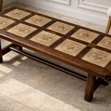 Vintage 60s coffee table with tile decoration of birds and flowers.