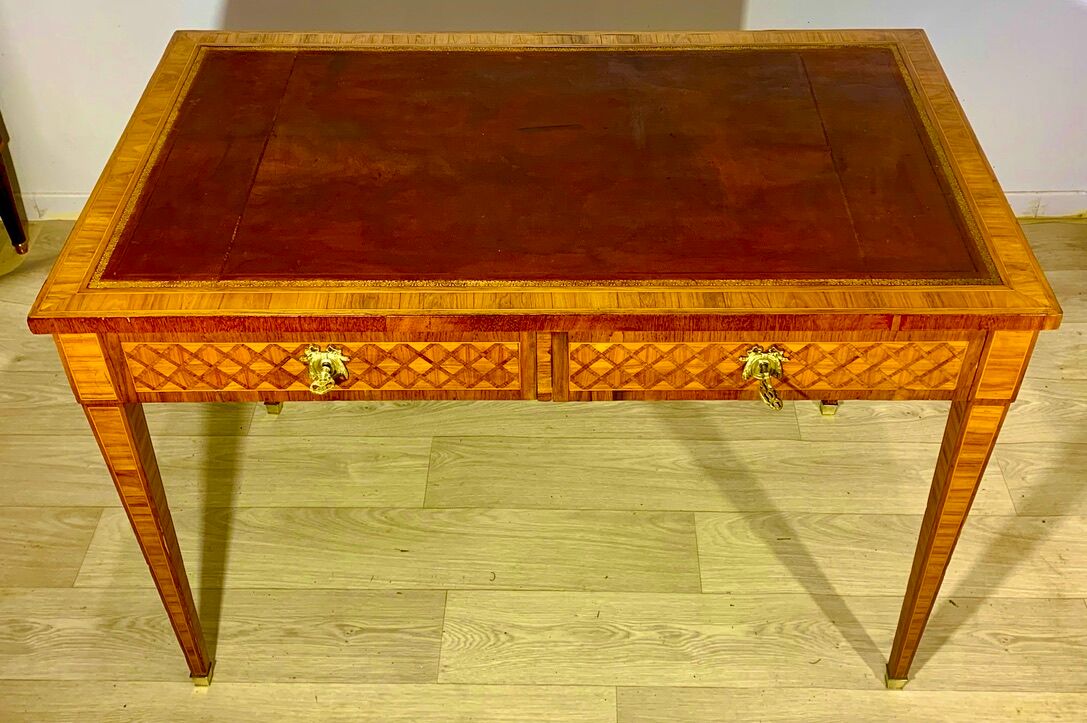 Louis XVI style desk in precious wood marquetry and gilded bronzes