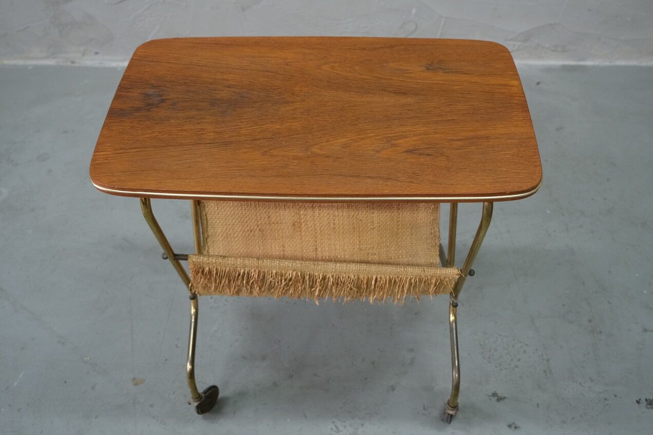 Mid-century teak and brass mobile side table with magazine holder, 1960s