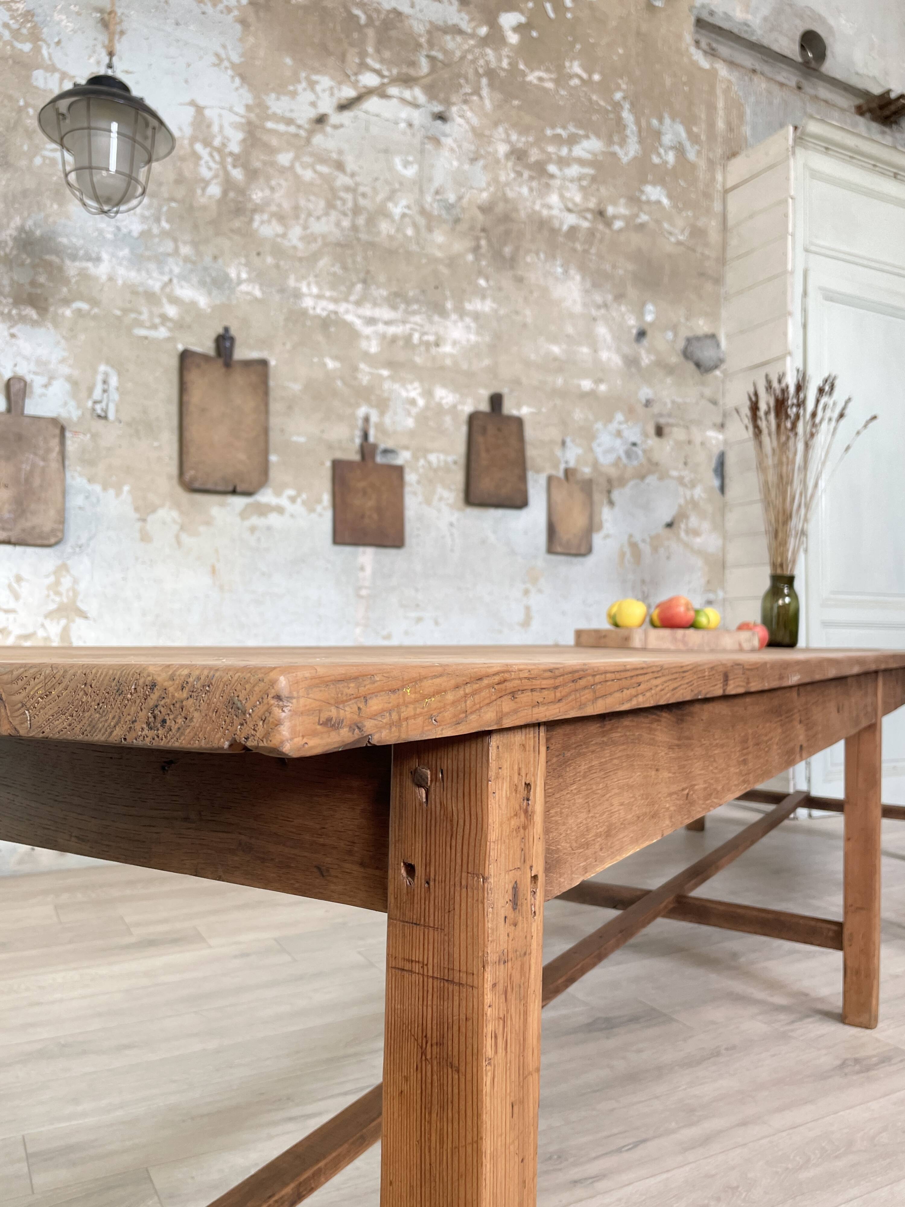 Solid wood workshop table with straight legs.