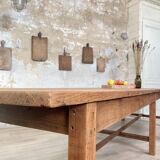 Solid wood workshop table with straight legs.