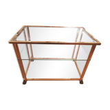 Trolley on wheels in gilded brass and beveled glass