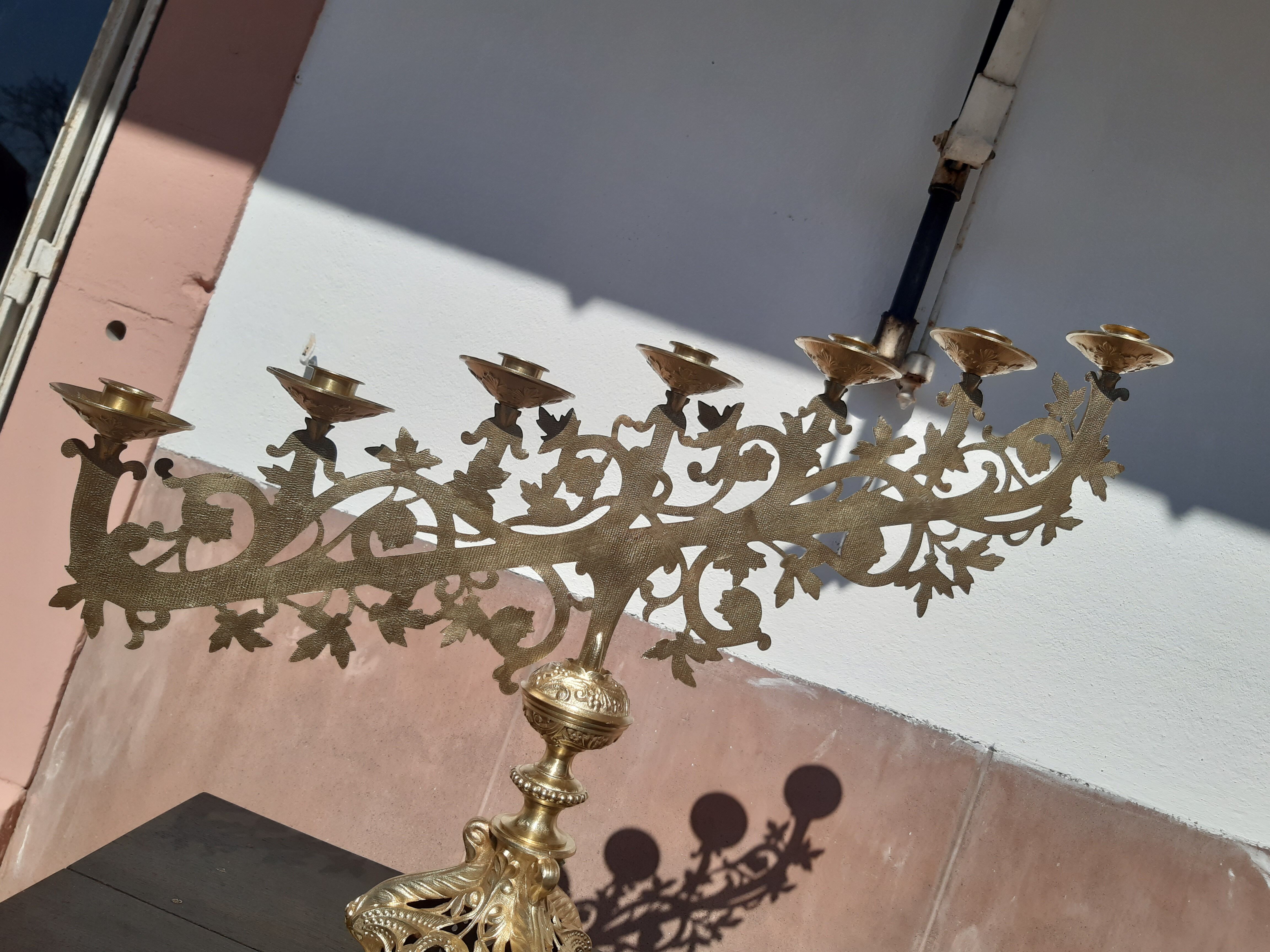 Antique candle holder in bronze and brass nineteenth century.