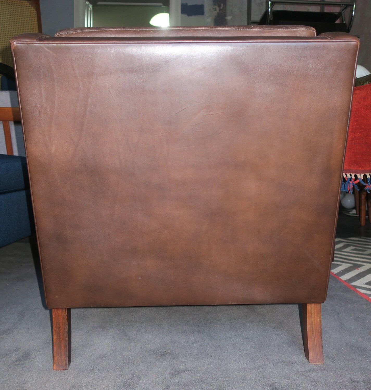 Fauteuil en cuir et bois de rose, années 1960