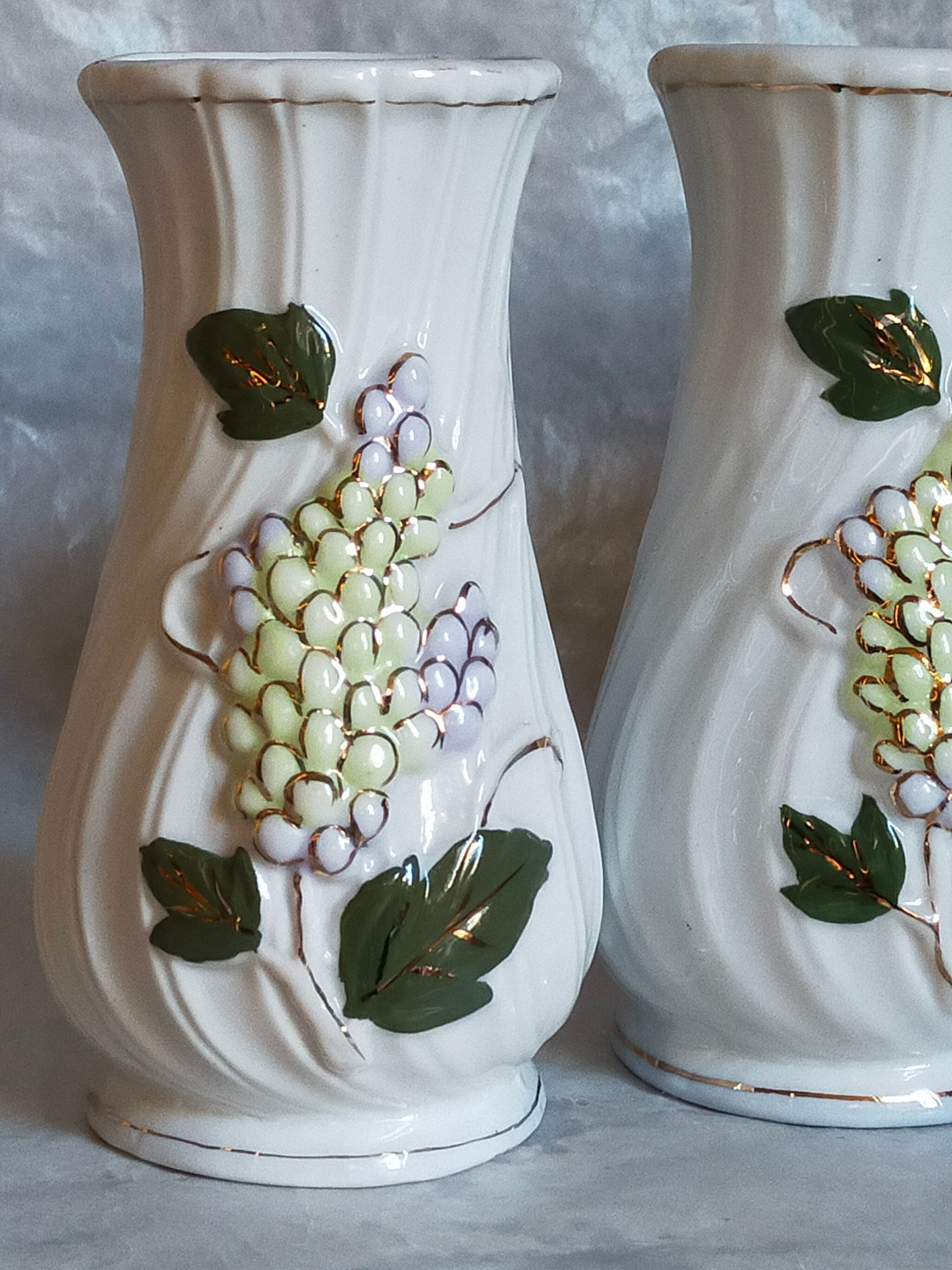 Three ancient lilac slurry vases