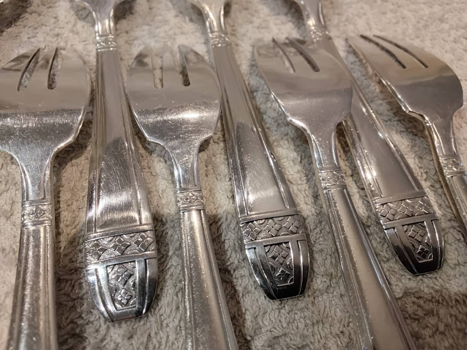 10 silver-plated metal cake forks from the Monaco Grand Prix