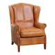 Fauteuil à oreilles en cuir de vache