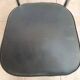 Vintage office chair in chrome metal and faux leather.