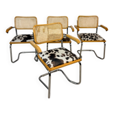 4 caned chairs in chrome and wood from the 1970s.