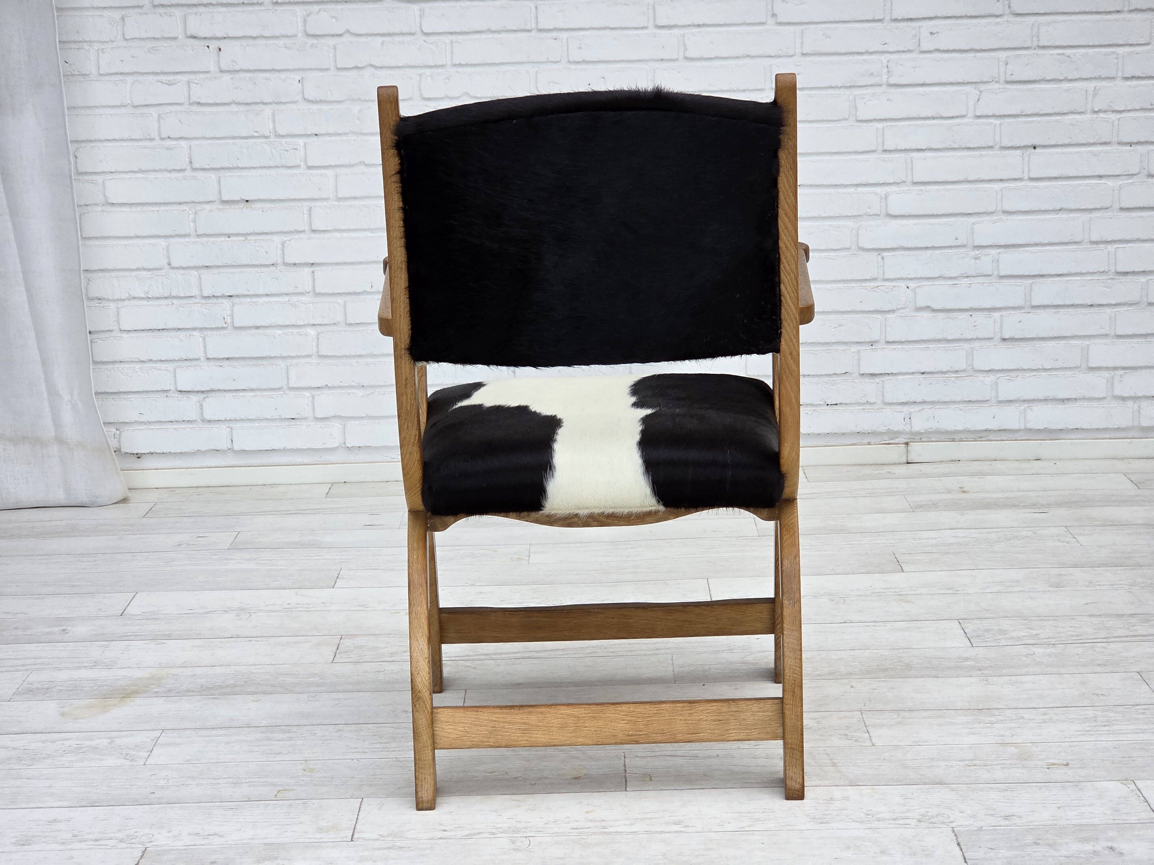 1960s, Danish highback armchair, genuine cowhide, oak wood, reupholstered.