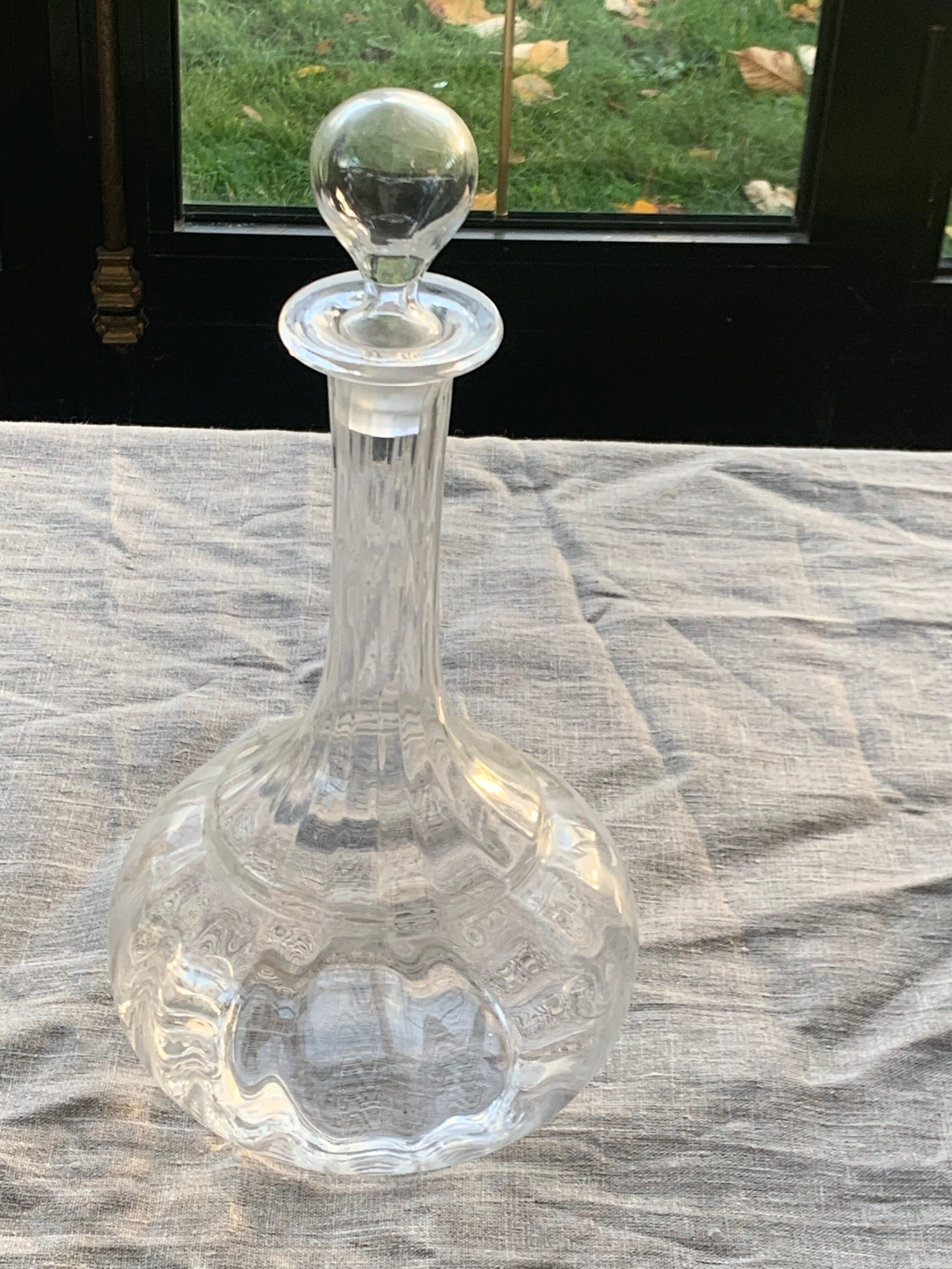 Elegant and vintage transparent glass wine decanter