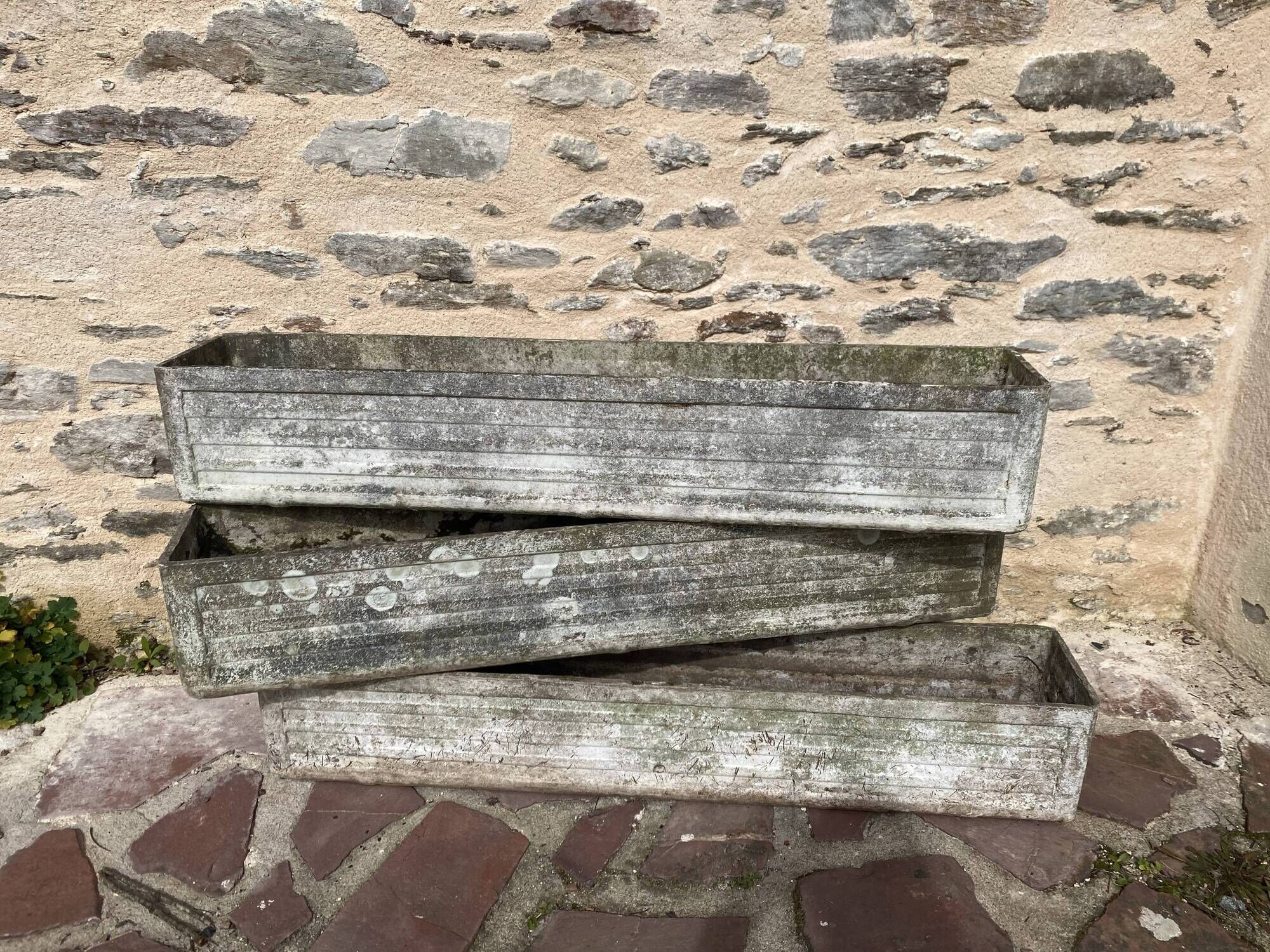Three fibro cement or eternite planters