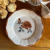 Vintage bell and its Digoin plate