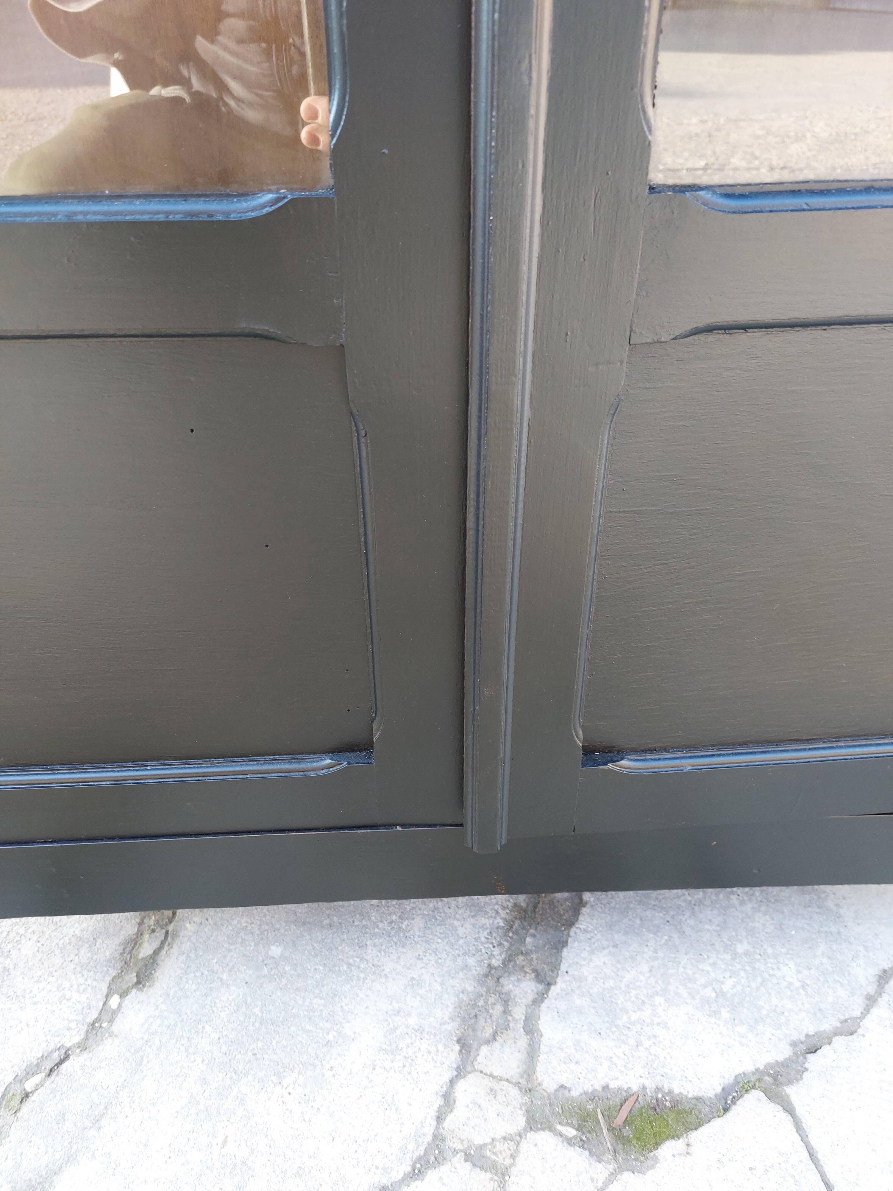 Parisian antique black patinated showcase