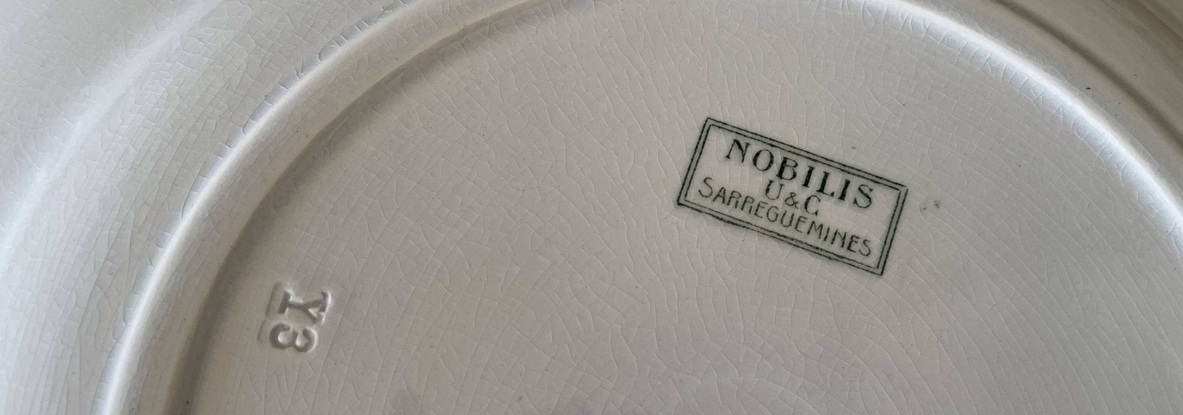 Antique serving platter in Sarreguemines earthenware.