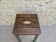 Tabouret à poignée en bois massif