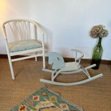 Vintage wooden rocking horse in its patina