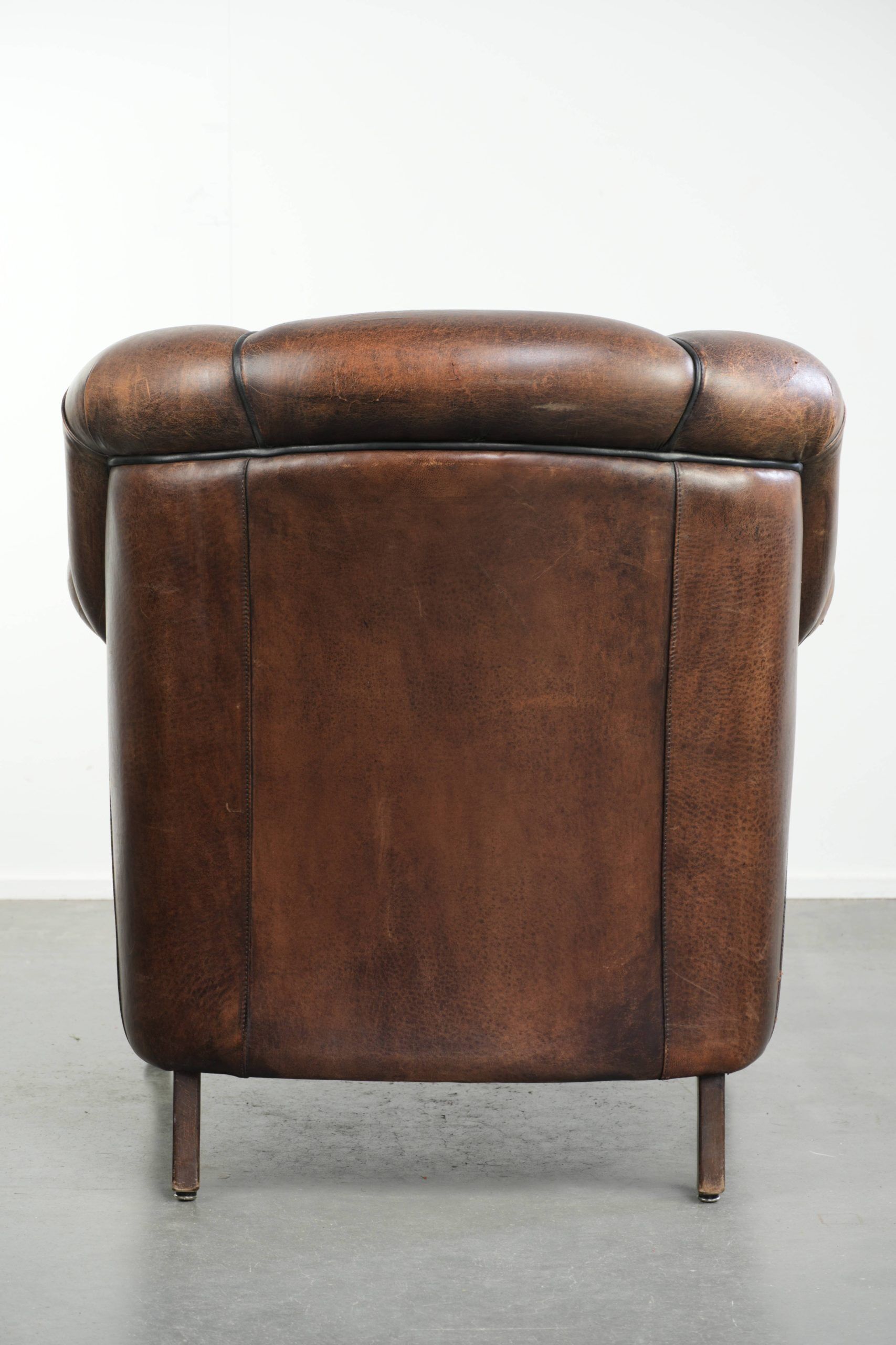 Vintage sheepskin armchair with a unique design and timeless appearance
