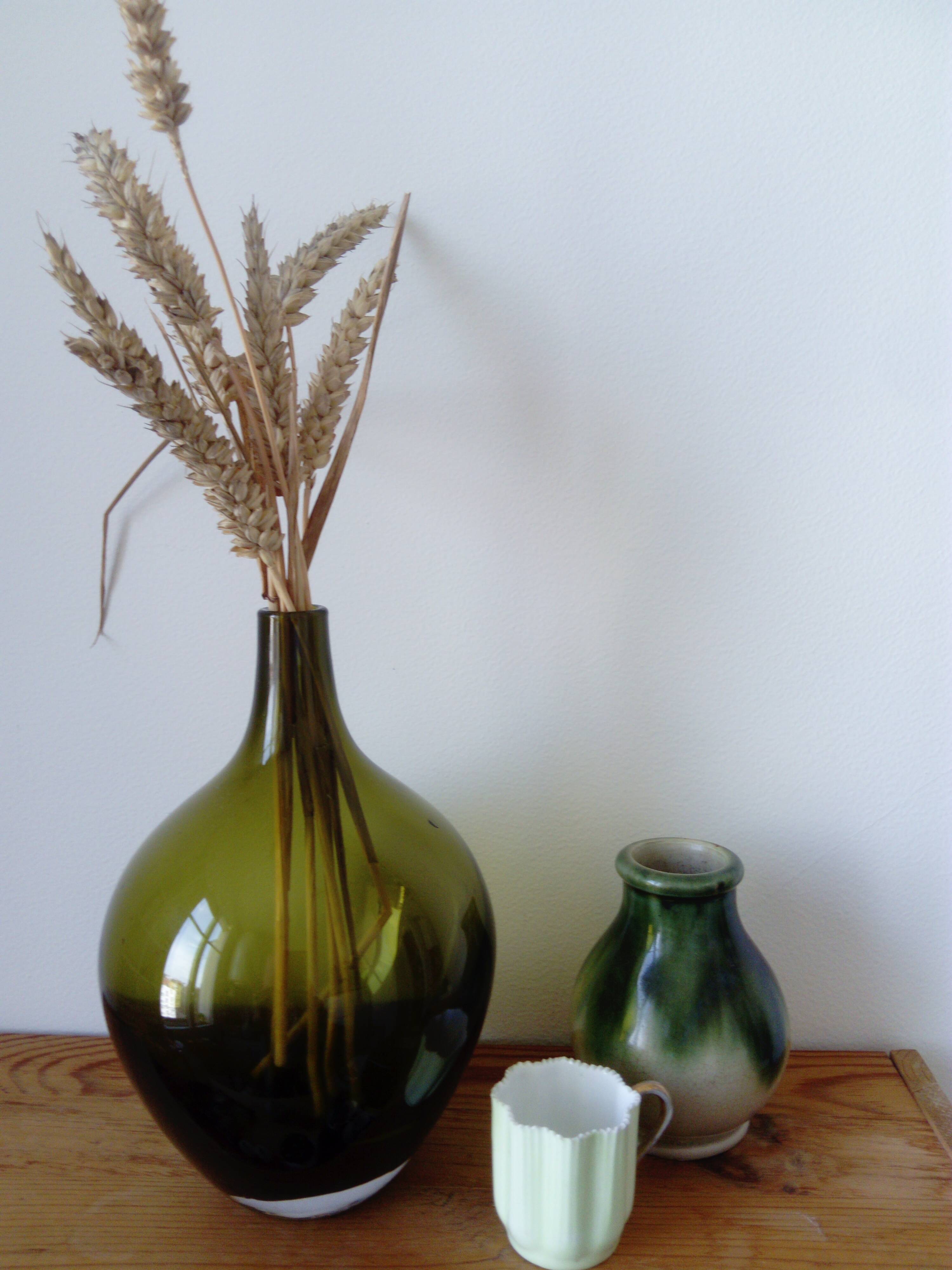 dark green drop-shaped glass vase