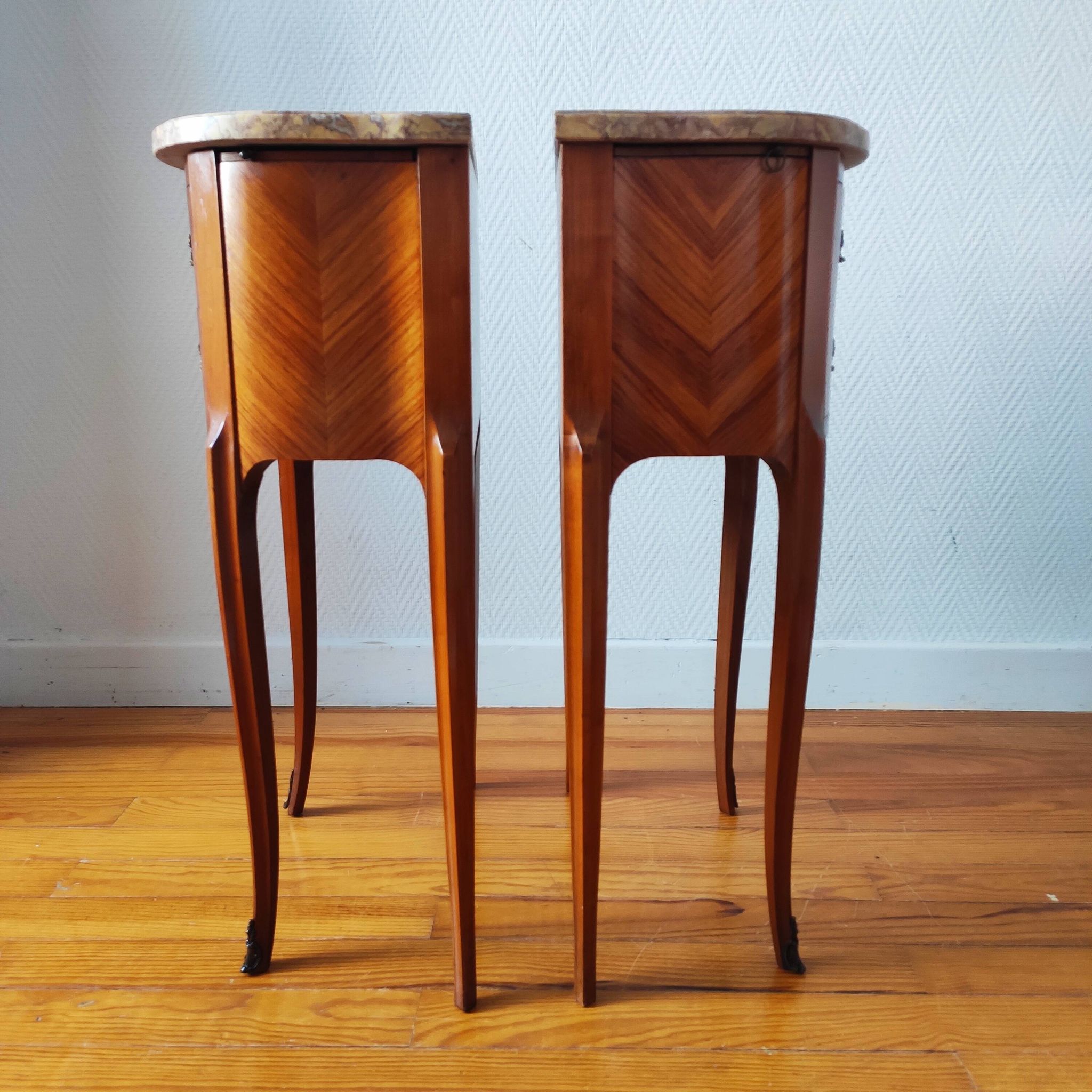 Pair of Louis XV style bedside tables with marquetry and marble.
