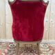 Art Nouveau gondola armchair – Carved wood & red theatre velvet – France