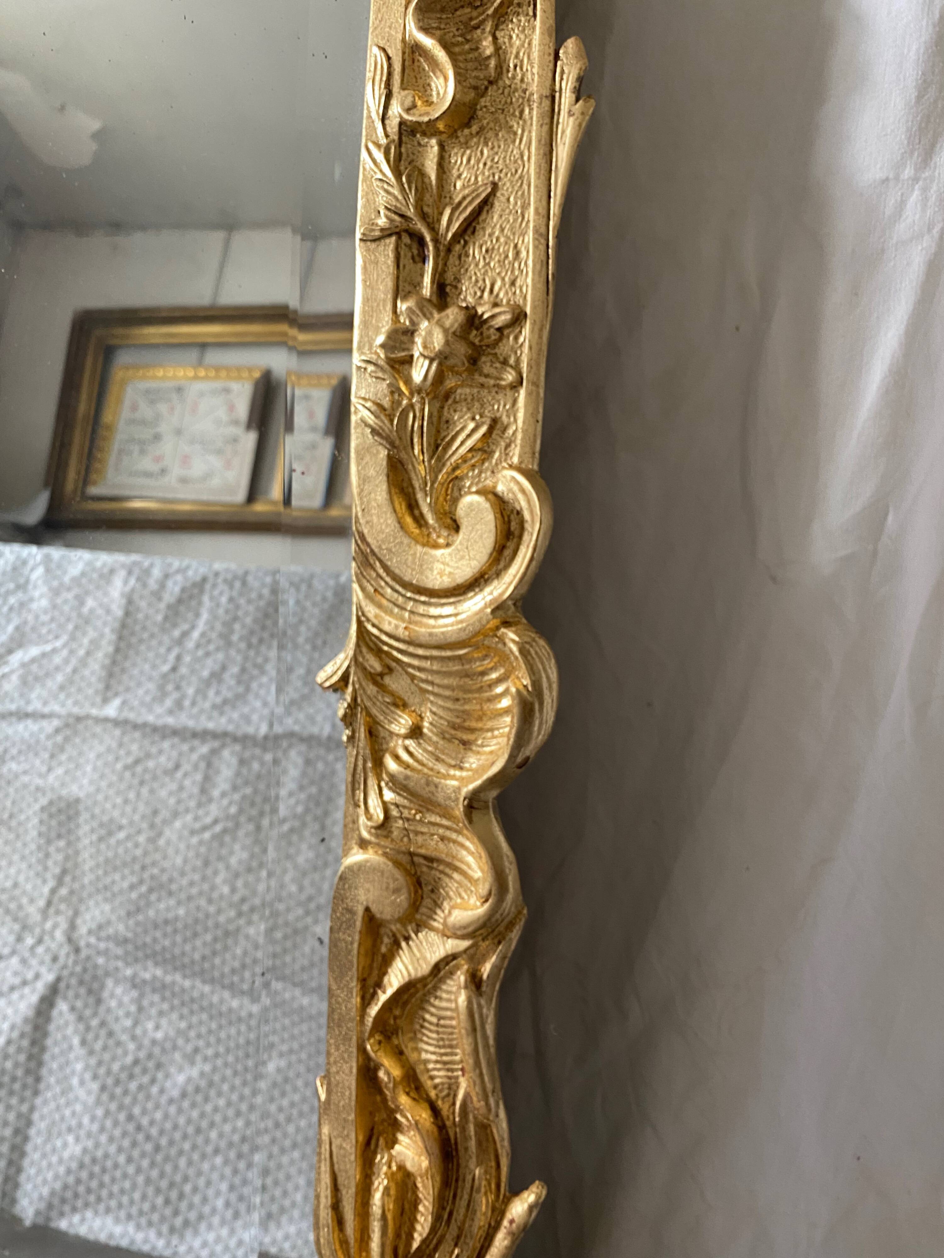 19th century gilded mirror with pediment