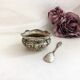 Silver metal salter and glass with salt shovel