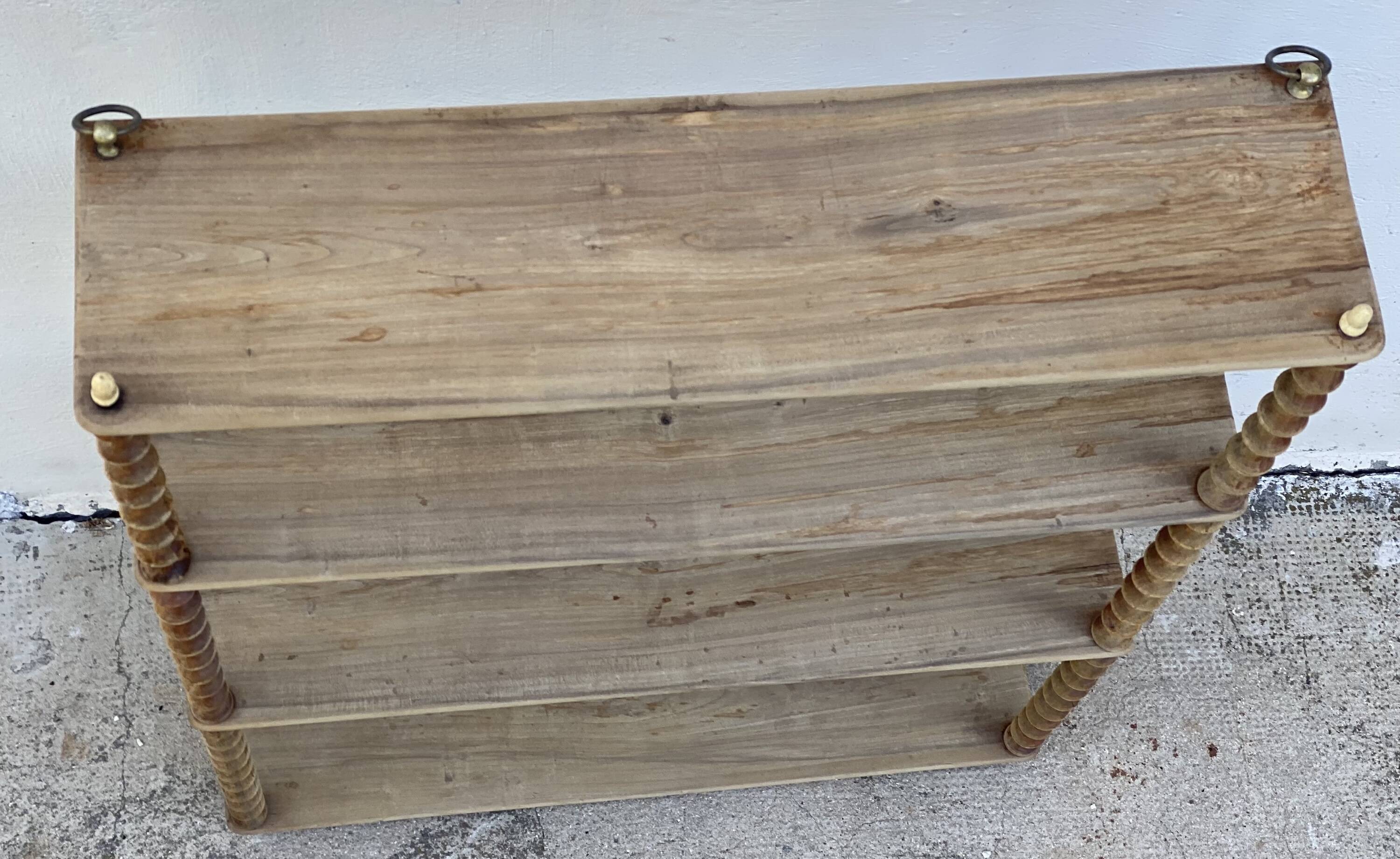Large 19th-century turned wood wall shelf, stripped.