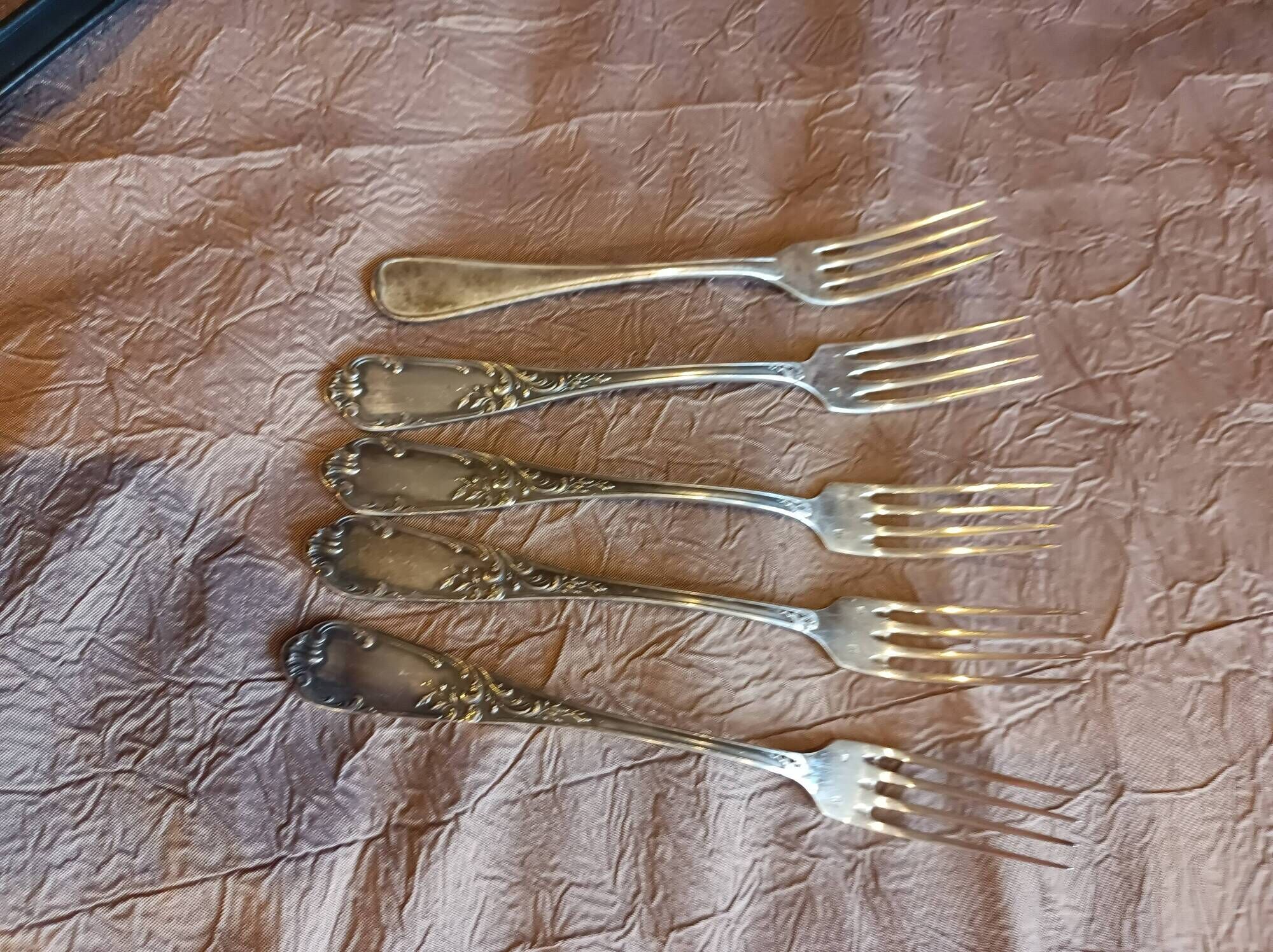 5 silver forks
