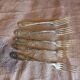 5 silver forks
