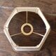 Table lamp with a patinated base and vintage woven shade.