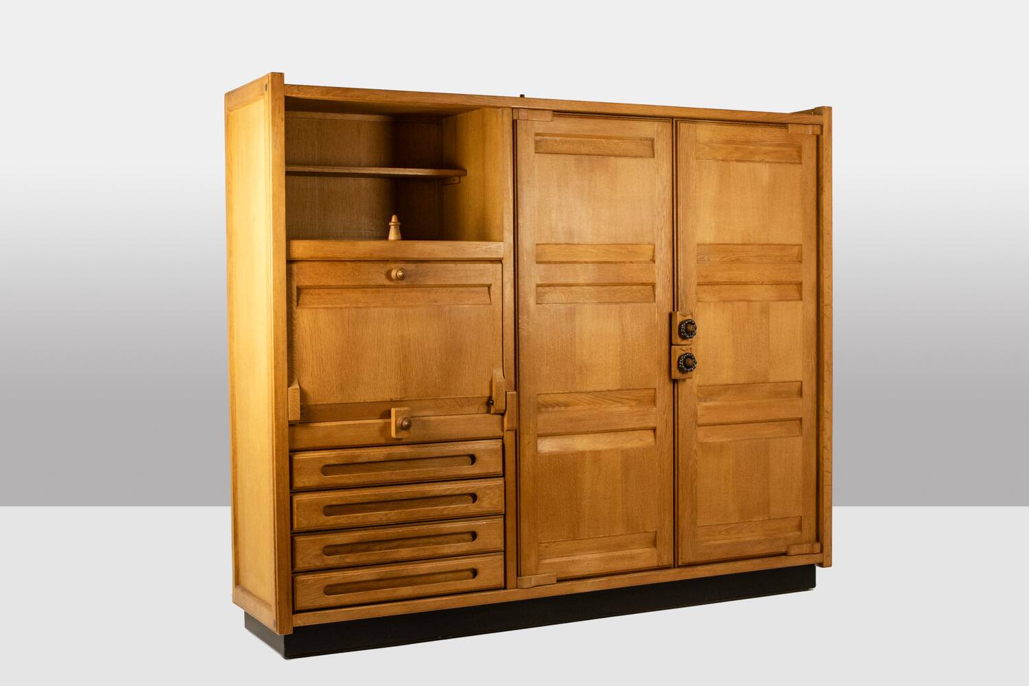Guillerme and Chambron. Oak wardrobe with integrated secretary. 1970-80.