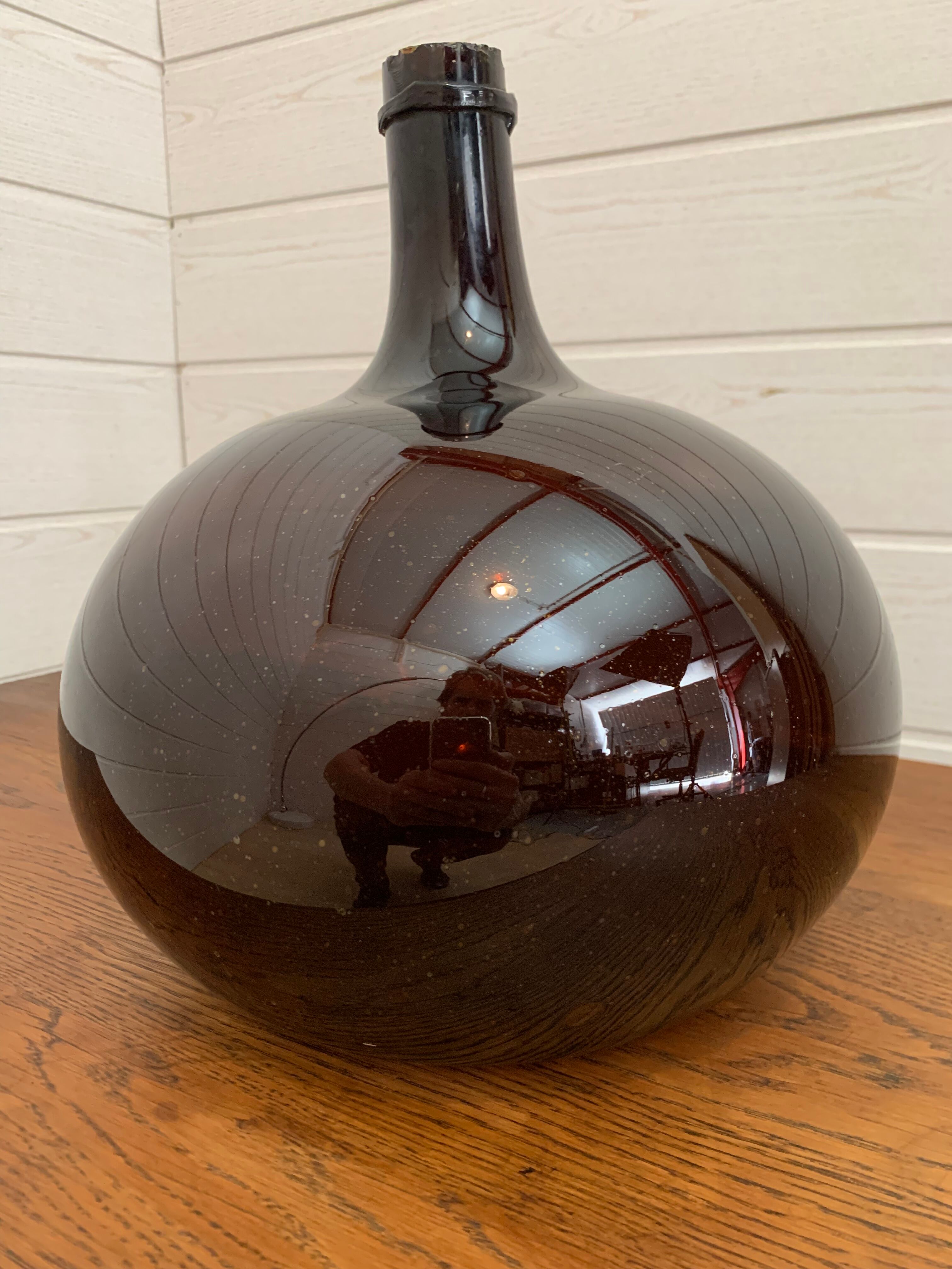 Demijohn in blown glass nineteenth amber color