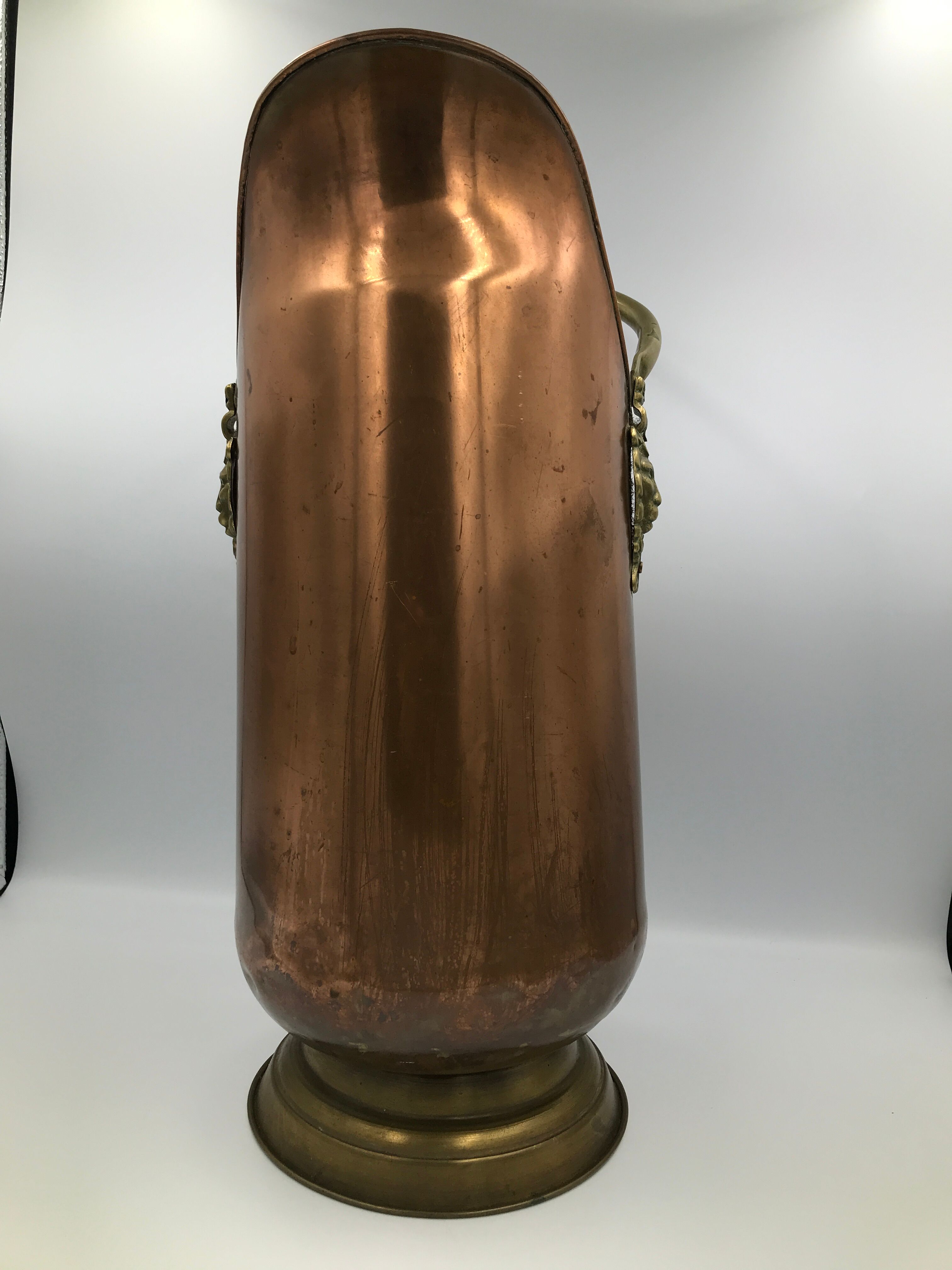 Copper umbrella holder and vintage porcelain handles