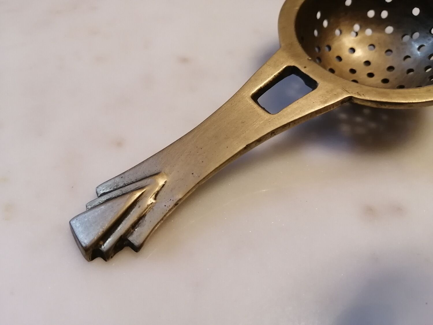 Art deco tea colander