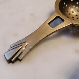 Art deco tea colander