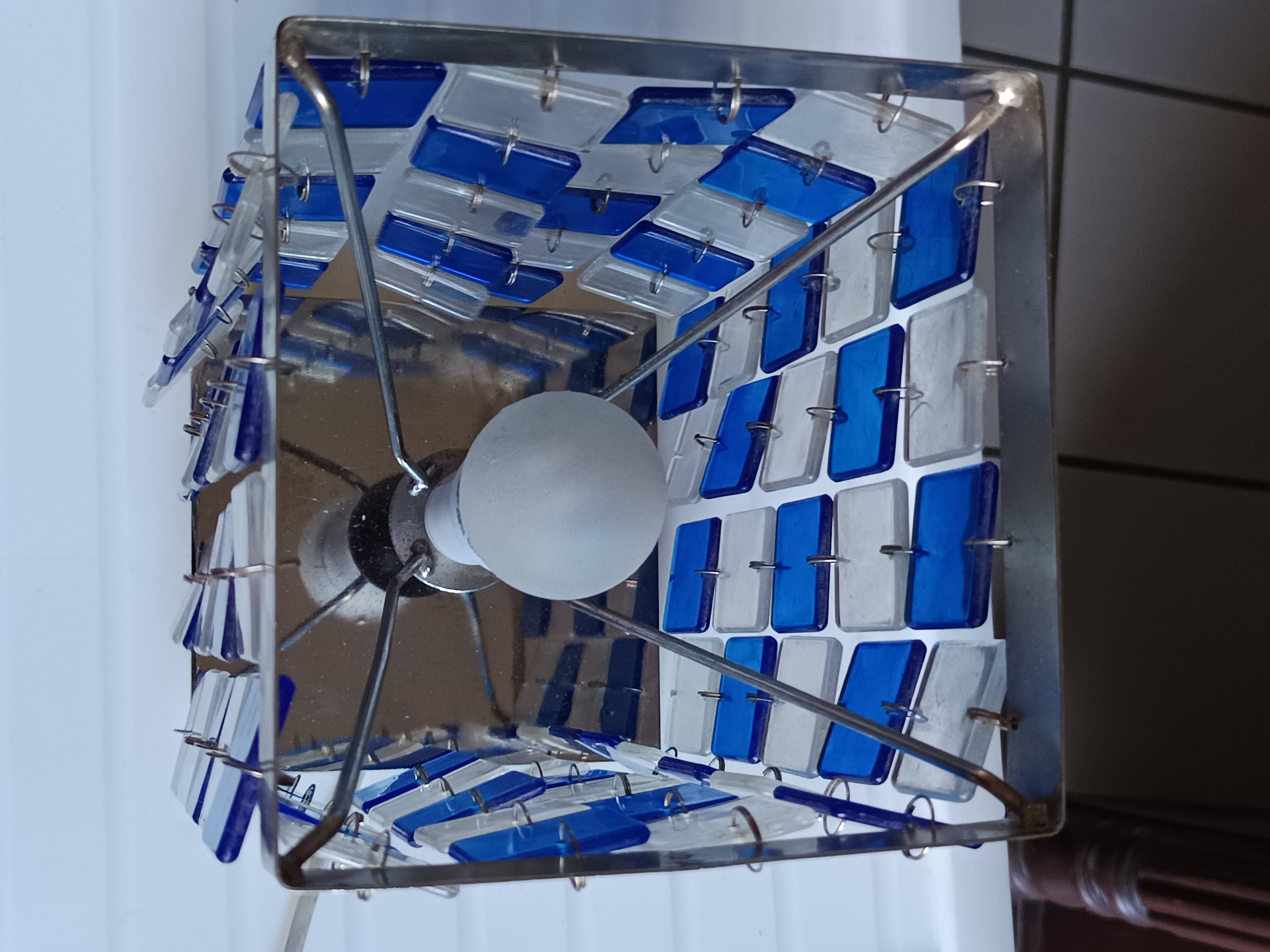 1970s designer table lamp with blue and clear plexiglass pendants.