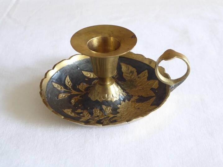 Brass hand candle holder