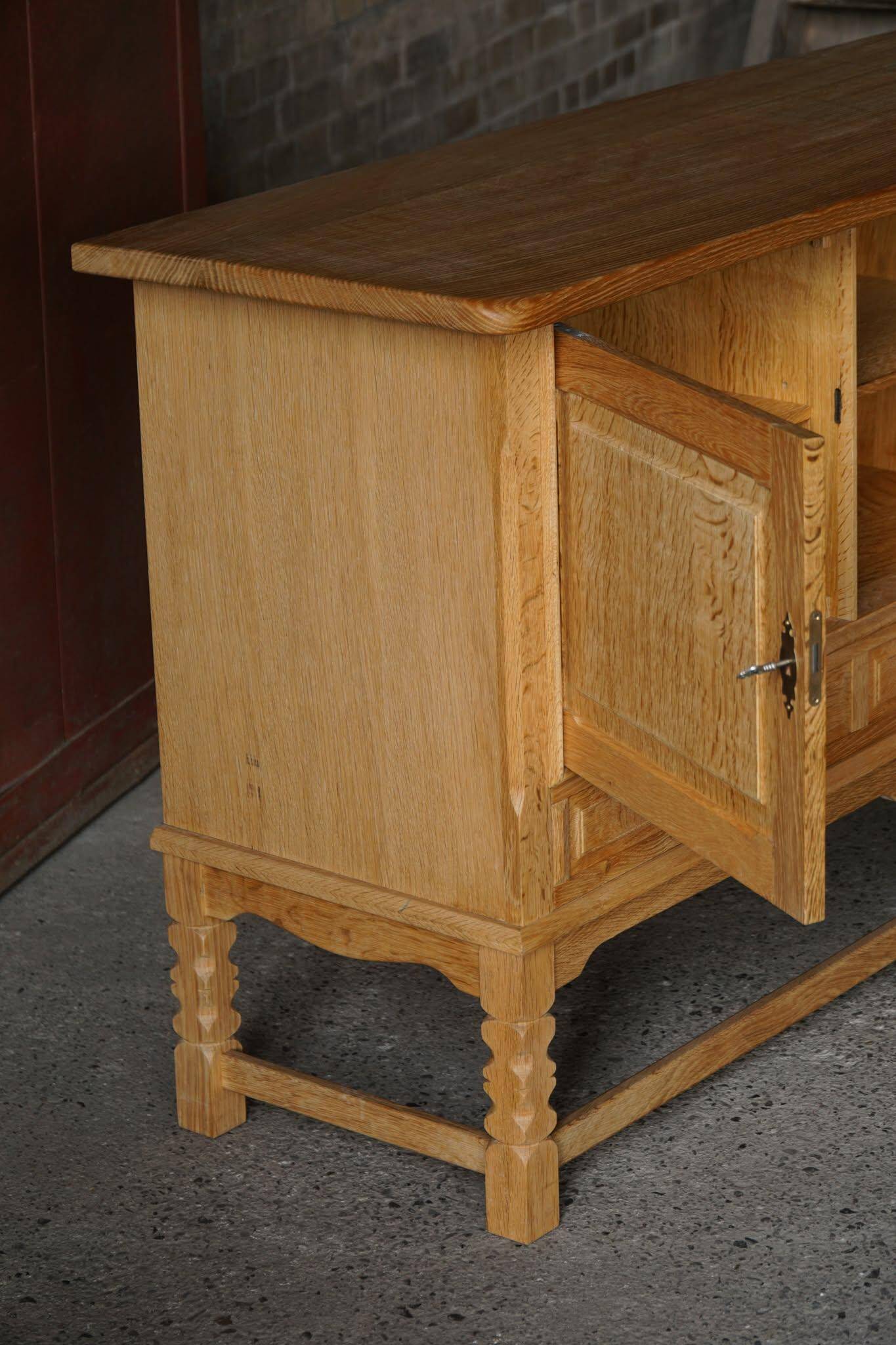 Brutalist Danish enfilade from the mid-century in oak by Henning Kjærnulf, 1960s.