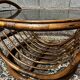 Vintage round coffee table in rattan and smoked glass