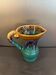 Flamed stoneware pitcher signed Alpho, no. 114