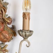 Pair of carved wood and metal sconces, Chelini FIrenze, Italy