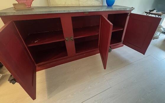Low red "Guérande" buffet, zinc top, butcher's fridge-style doors