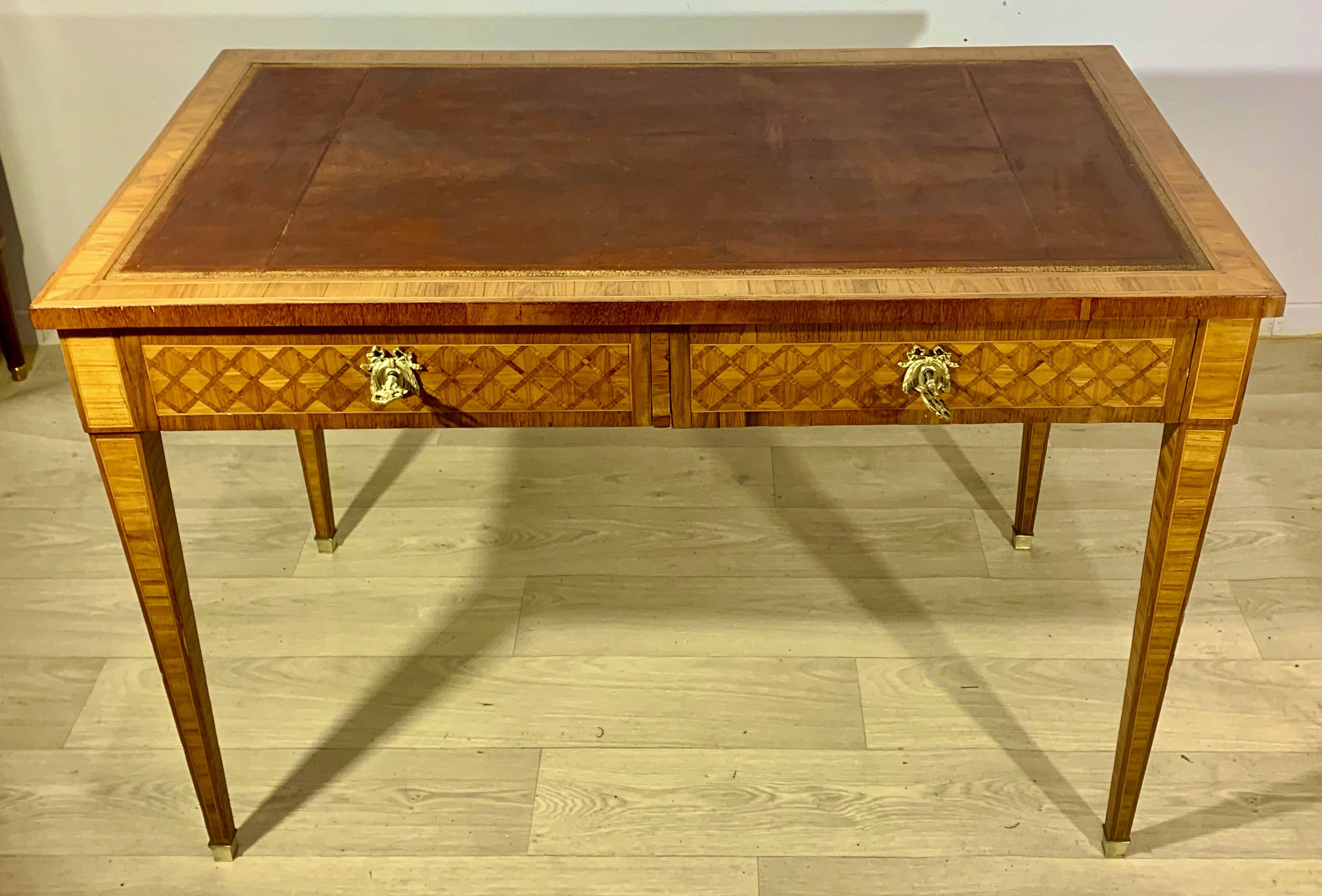 Louis XVI style desk in precious wood marquetry and gilded bronzes