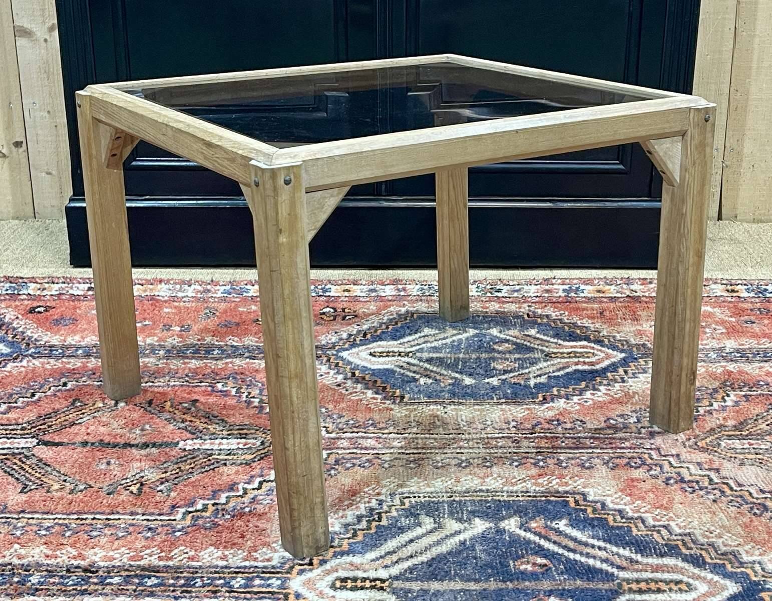 Coffee table in oak with a glass top, dating from the 1950s