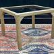 Coffee table in oak with a glass top, dating from the 1950s