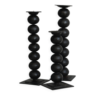 trois bougeoirs design en métal noir mat