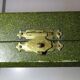 Silver salad servers stuffed in its case